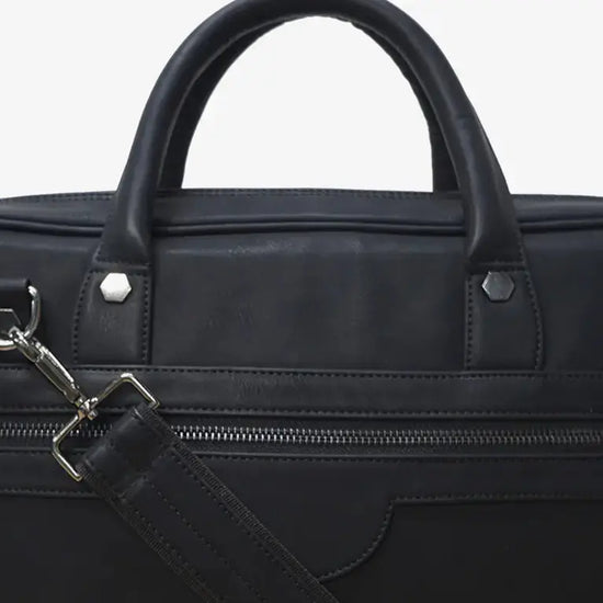 Corporate Professional Using Black ZenMatte Laptop Bag During Business Meeting