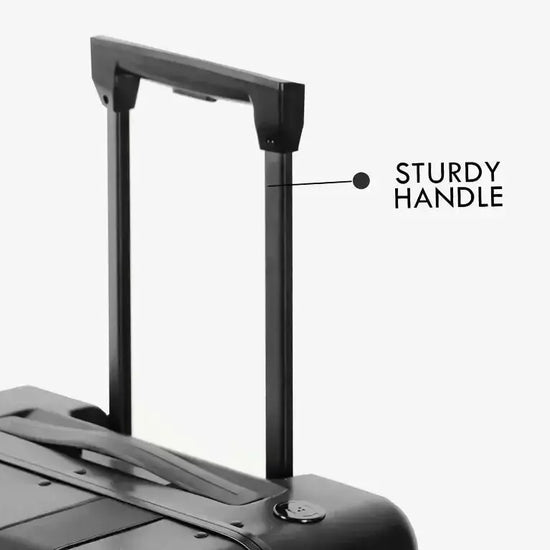Business Traveler with Black Follow Me Luggage Demonstrating Auto-Follow Technology