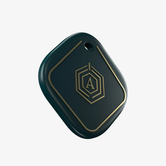 Side Profile of Navy Blue Smart Keychain Showing Sleek Design and Key Ring Attachment