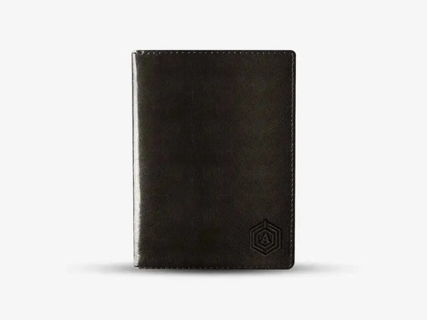Smartphone Displaying Arista Tracker App Connected to Brown Smart Passport Holder for Location