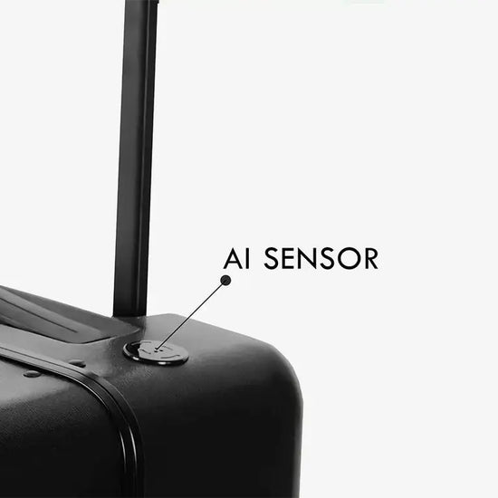 Side View of Black Self-Following Luggage with AI Sensors and Rideable Design
