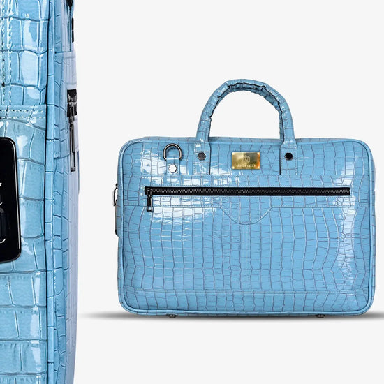 Close-up of Fingerprint Scanner on Sky Blue Croc Patterned Laptop Bag