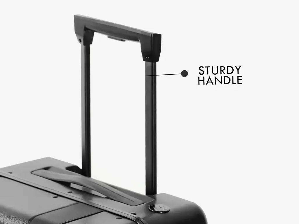 Business Traveler with Black Follow Me Luggage Demonstrating Auto-Follow Technology
