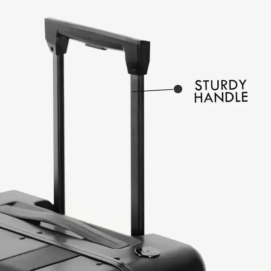 Business Traveler with Black Follow Me Luggage Demonstrating Auto-Follow Technology