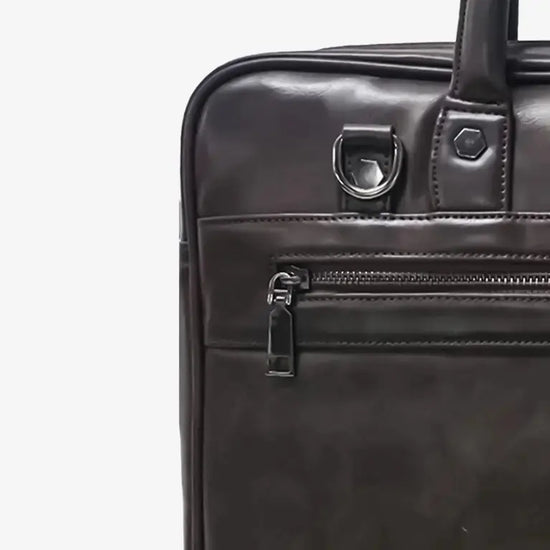 Close-up of ZenMatte Brown Bag's Biometric Lock System with Multiple User Registration