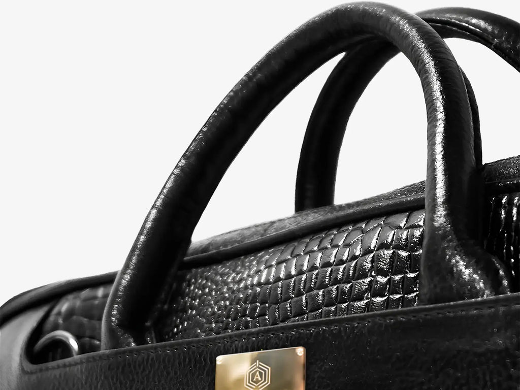 Executive Using Black Croc Textured Leather Bag with Fingerprint Security During Business Travel