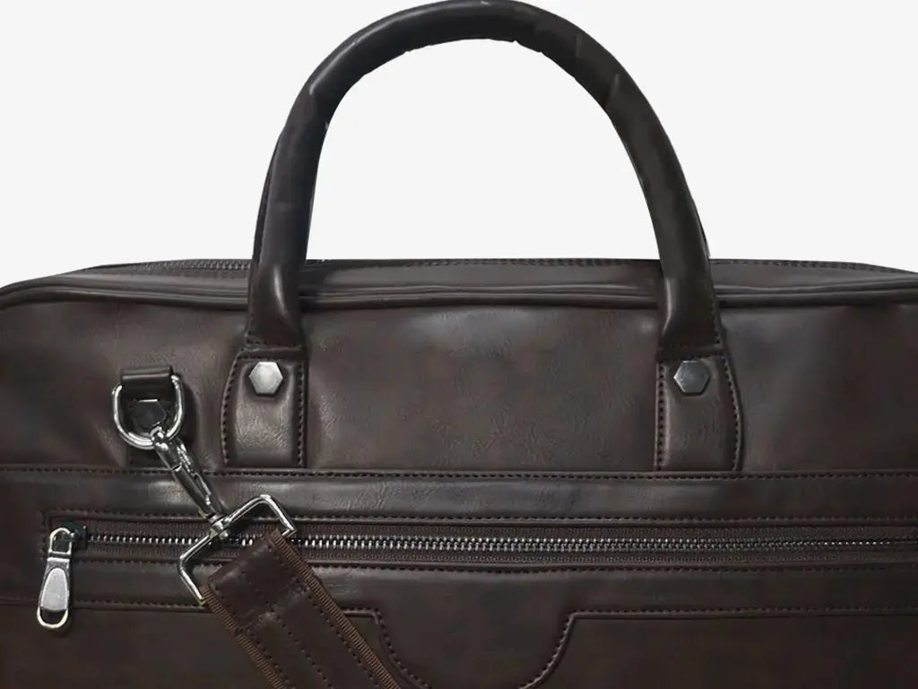Business Traveler Using Brown ZenMatte Laptop Bag with Fingerprint Security at Airport